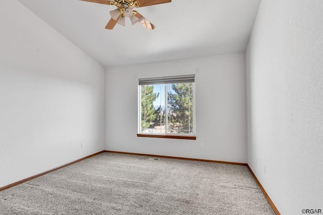 unfurnished room featuring vaulted ceiling, ceiling fan, and carpet