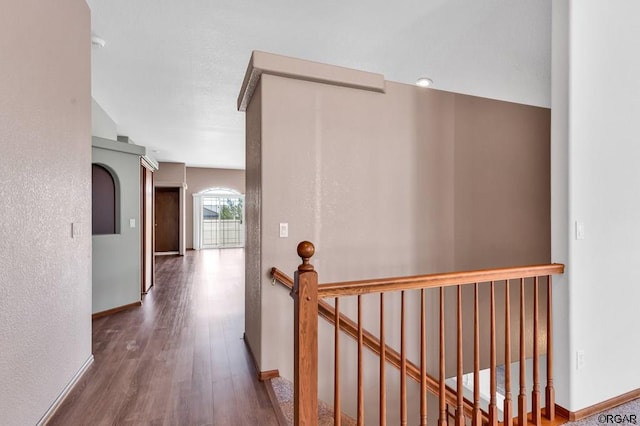 hall with wood-type flooring