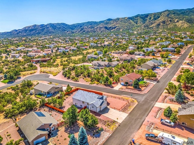 birds eye view of property featuring a mountain view