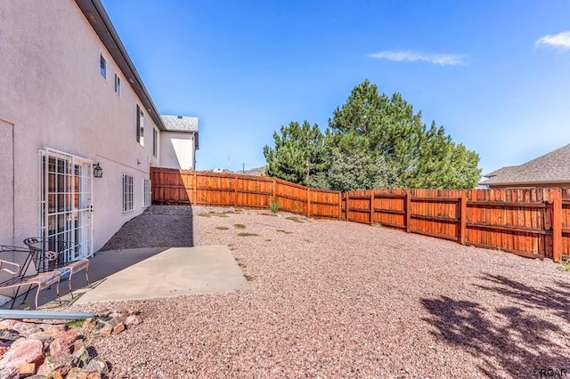 view of yard featuring a patio