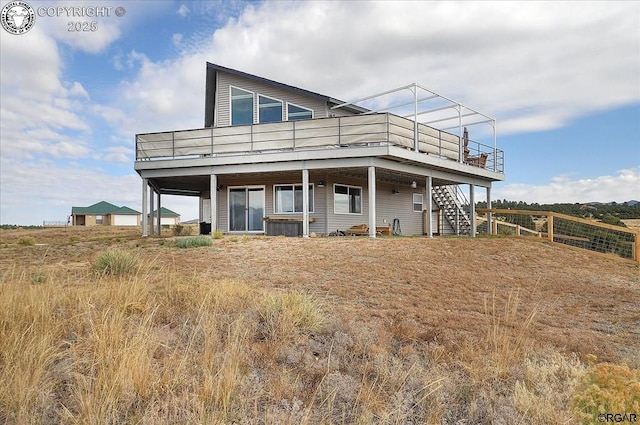 136 Arapahoe Cir, Westcliffe, CO 81252 - back of house featuring a deck and stairs
