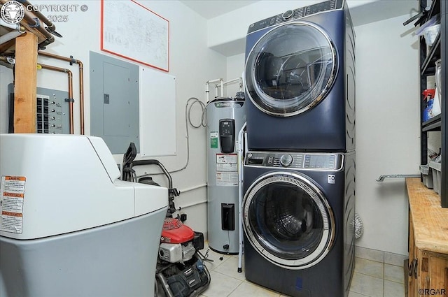 136 Arapahoe Cir, Westcliffe, CO 81252 - laundry area with stacked washer and clothes dryer, water heater, light tile patterned floors, and electric panel