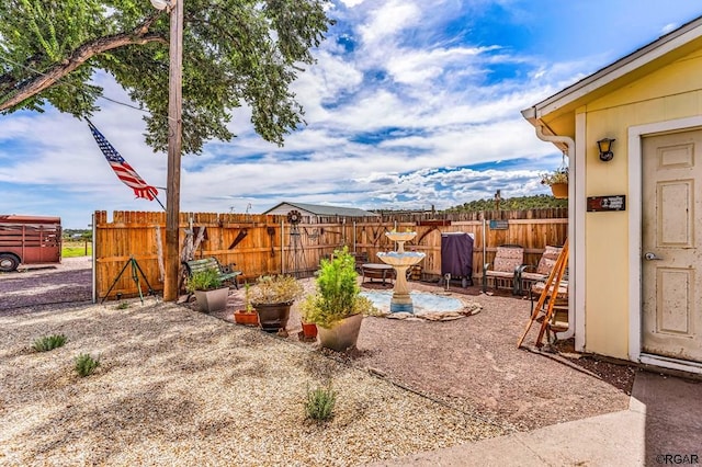 view of yard with a patio area