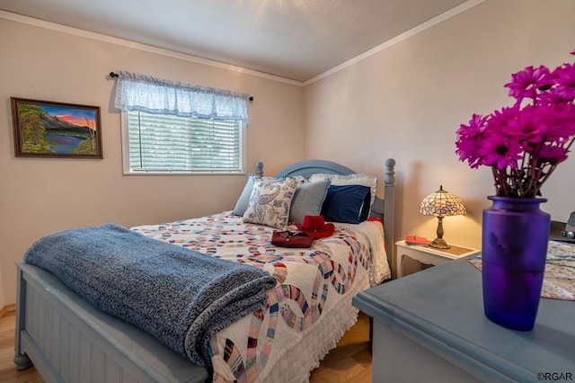 bedroom featuring crown molding