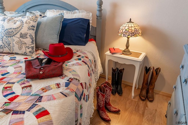 bedroom with light hardwood / wood-style floors