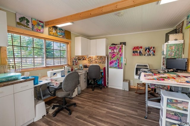 home office with dark hardwood / wood-style floors, heating unit, and beam ceiling