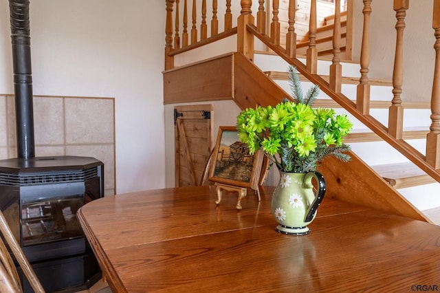 dining space featuring a wood stove