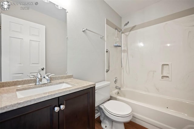 full bathroom featuring shower / tub combination, vanity, toilet, and wood-type flooring