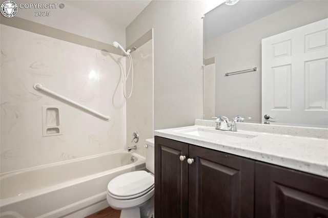 full bathroom featuring vanity, tub / shower combination, and toilet