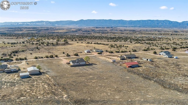 aerial view featuring a mountain view