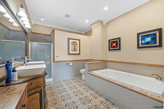 full bathroom featuring ornamental molding, vanity, tile patterned floors, and toilet