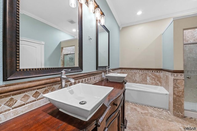 bathroom with crown molding, hardwood / wood-style flooring, tile walls, vanity, and plus walk in shower