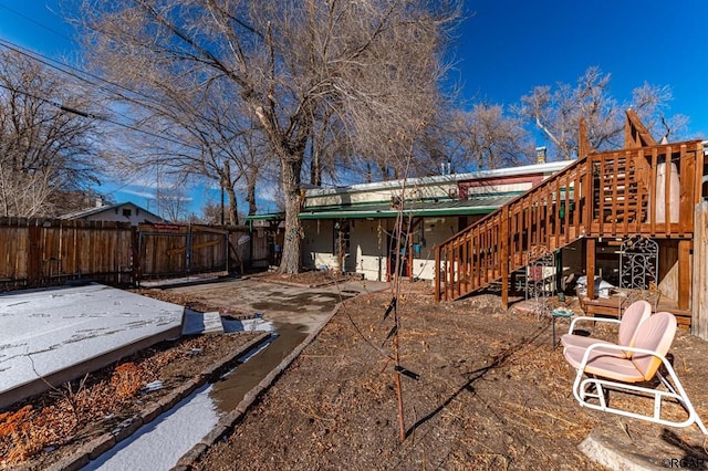 rear view of property featuring a patio area