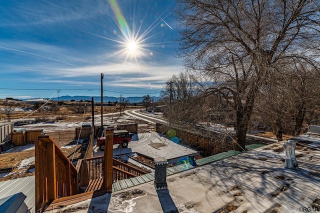 view of patio with a deck with mountain view