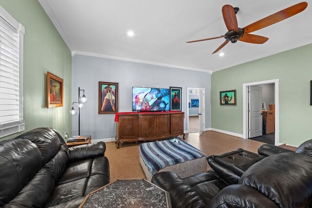 living room featuring crown molding and ceiling fan