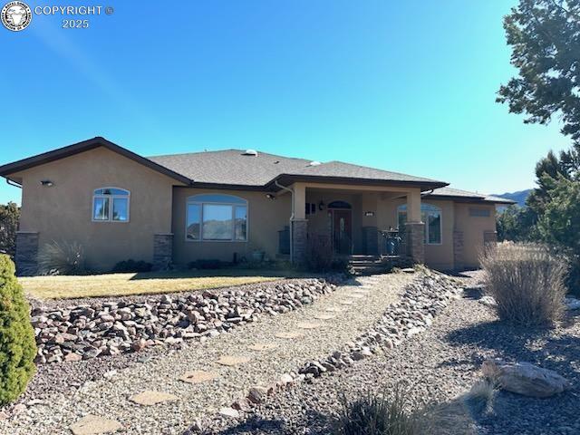 view of front of home featuring stucco siding