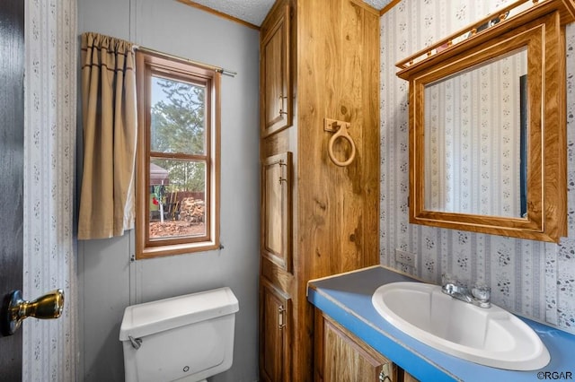 bathroom featuring sink and toilet