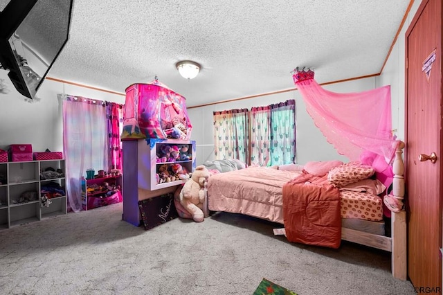 carpeted bedroom featuring a textured ceiling