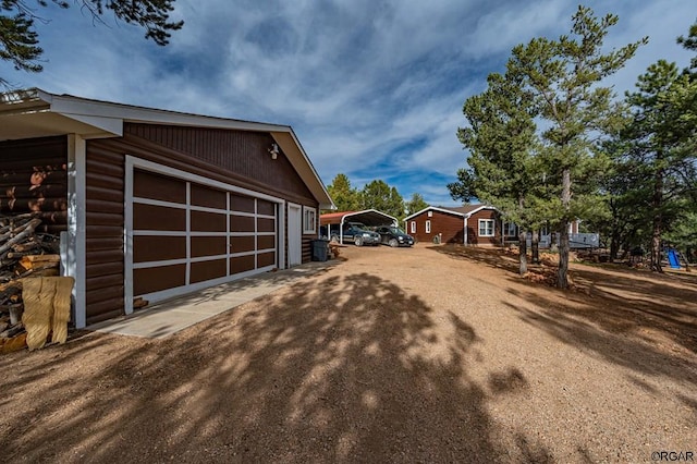 garage with a carport