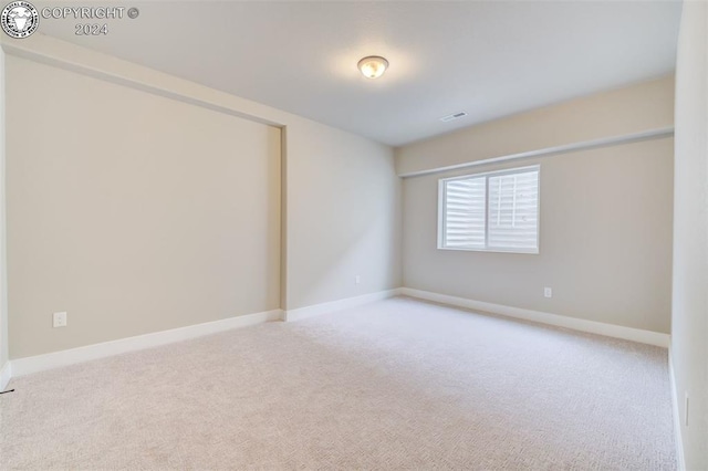 empty room with light carpet