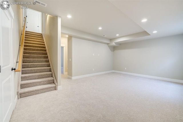 basement with light carpet