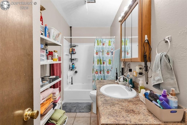 full bathroom with vanity, toilet, tile patterned flooring, and shower / tub combo