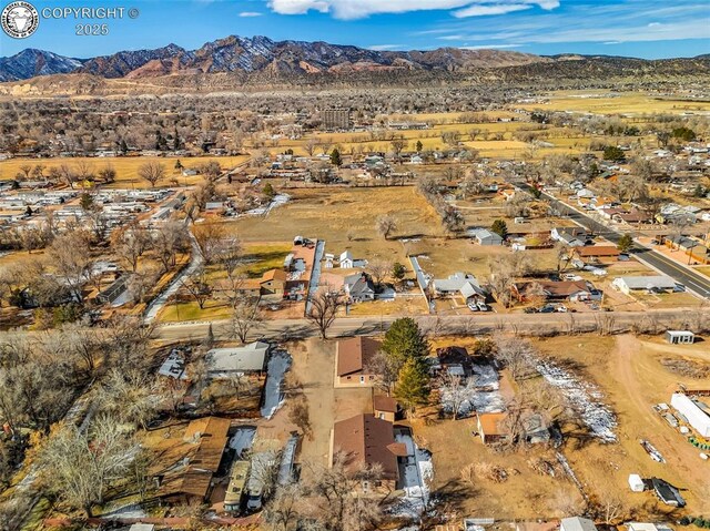 bird's eye view with a mountain view