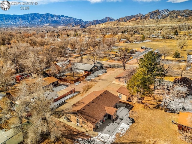 drone / aerial view featuring a mountain view