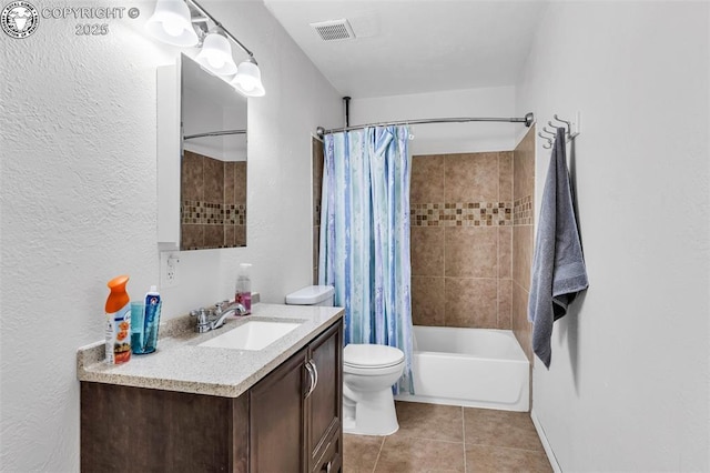 full bathroom featuring tile patterned flooring, vanity, toilet, and shower / bath combo with shower curtain