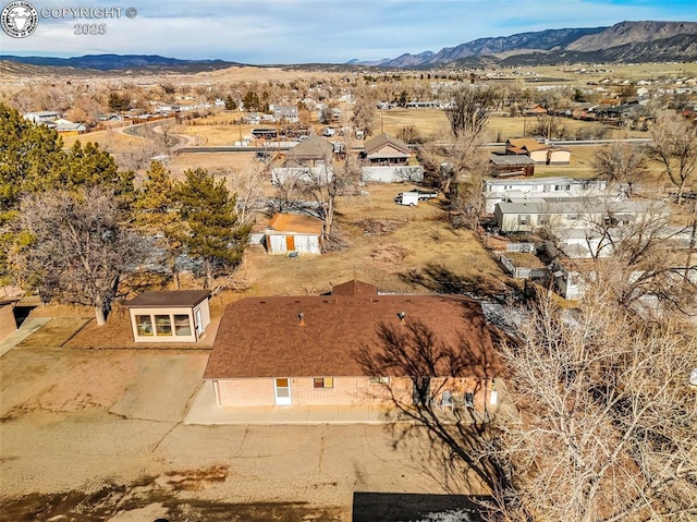 bird's eye view with a mountain view