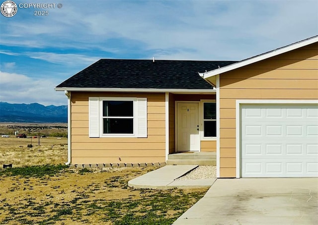 248 Indian Hills Rd, Florence, CO 81226 - view of exterior entry featuring a mountain view