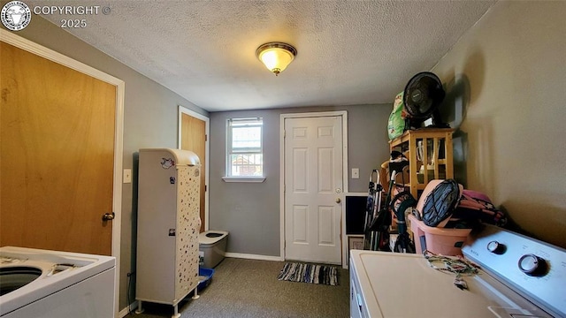 1318 Spruce St, Pueblo, CO 81004 - laundry room with carpet, a textured ceiling, and washer and clothes dryer