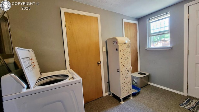1318 Spruce St, Pueblo, CO 81004 - washroom with separate washer and dryer and carpet flooring