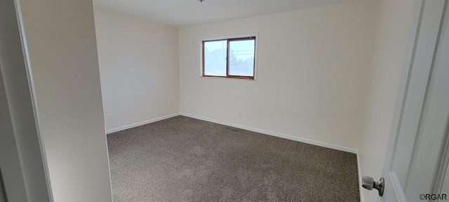 view of carpeted spare room