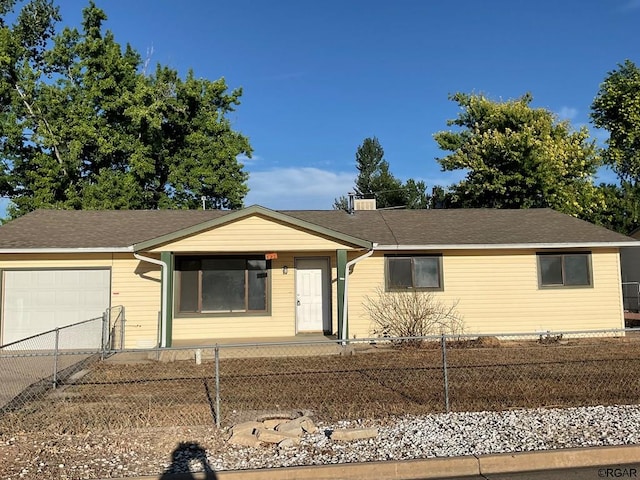 single story home with a garage