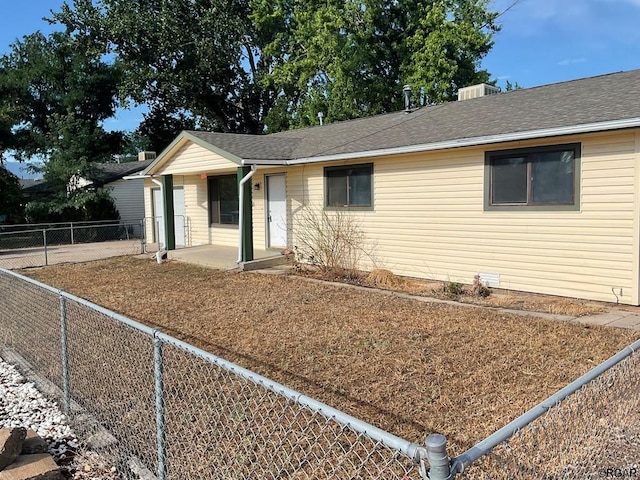 ranch-style home with a patio area