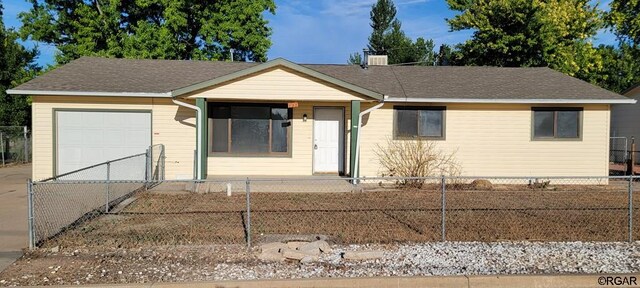 ranch-style home with a garage