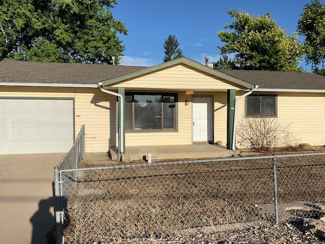 single story home featuring a garage