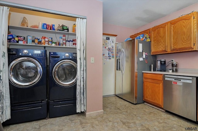 washroom featuring separate washer and dryer