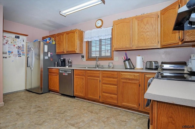 kitchen featuring stainless steel appliances and sink