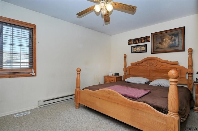 bedroom featuring ceiling fan, a baseboard radiator, and carpet flooring