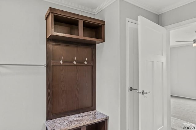 mudroom featuring ornamental molding