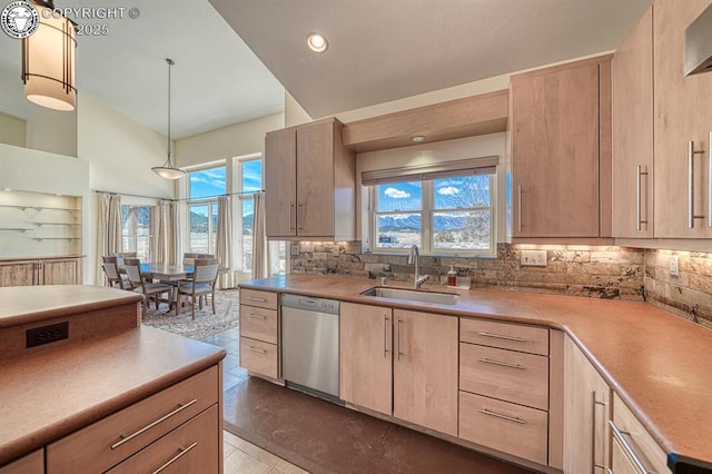 750 Roundup Rd, Westcliffe, CO 81252 - kitchen featuring tasteful backsplash, a sink, dishwasher, and light brown cabinets