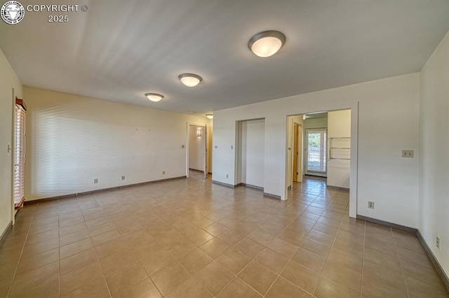 750 Roundup Rd, Westcliffe, CO 81252 - empty room with baseboards and light tile patterned flooring