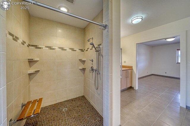 750 Roundup Rd, Westcliffe, CO 81252 - bathroom with tile patterned flooring, vanity, and a tile shower