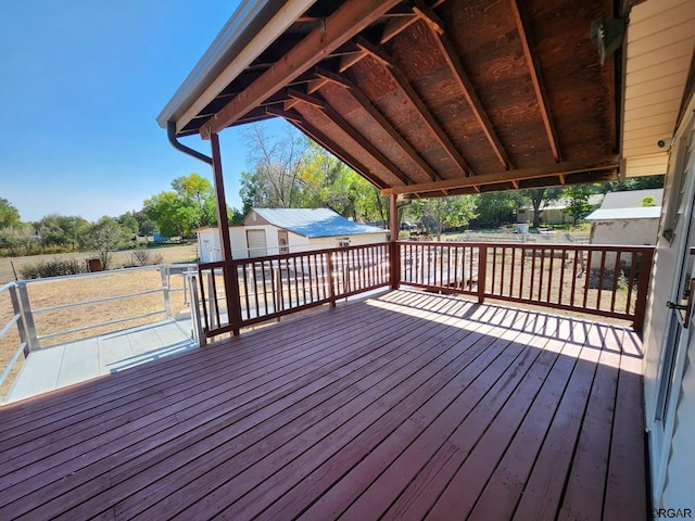 deck featuring a storage unit