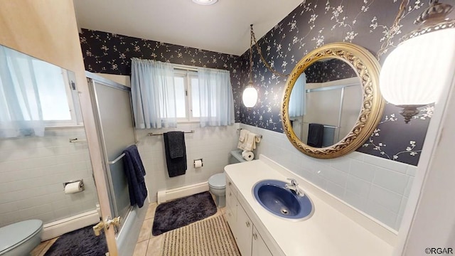 bathroom with walk in shower, tile patterned floors, toilet, and a baseboard heating unit