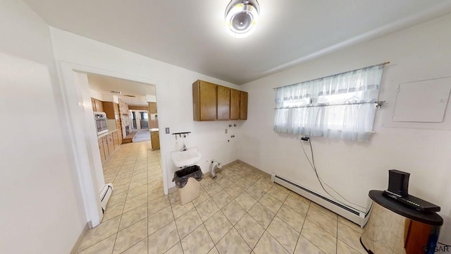 laundry area featuring baseboard heating