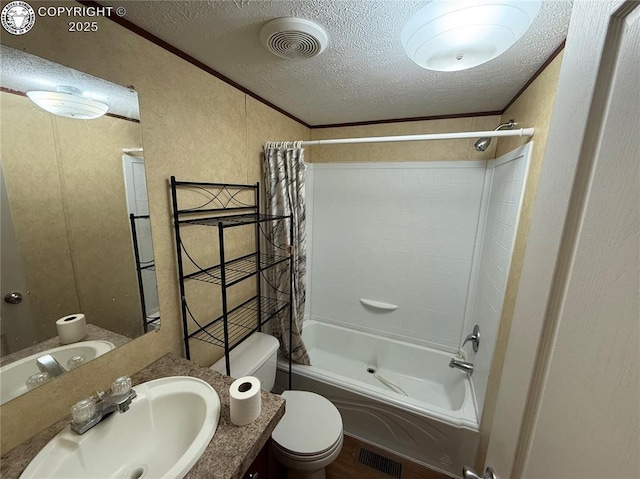 full bathroom with ornamental molding, shower / bath combination with curtain, a textured ceiling, and toilet