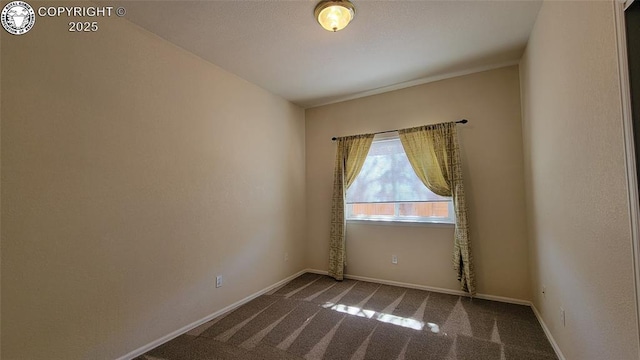 1002 Cedarcrest Dr, Pueblo, CO 81005 - carpeted empty room with baseboards